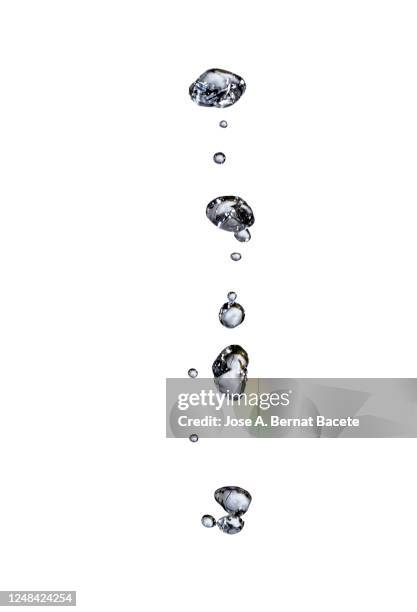 group of drops on line suspended in the air, falling down on a water surface on a white background. - bubbles white background stock pictures, royalty-free photos & images