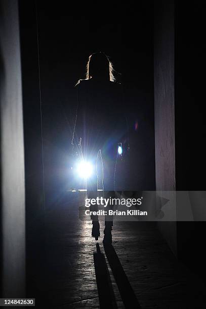 Model walks the runway during rehearsal just before the Edun Spring 2012 fashion show during Mercedes-Benz Fashion Week at 330 West Street on...