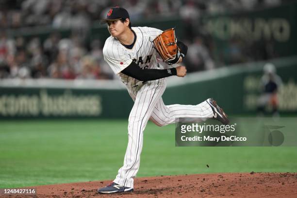 Shohei Ohtani of Team Japan pitches during the 2023 World Baseball Classic Quarterfinals game between Team Italy and Team Japan at Tokyo Dome on...