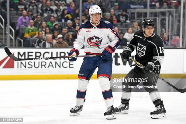 Columbus Blue Jackets Right Wing Patrik Laine and Los Angeles Kings Left Wing Trevor Moore watch play during an NHL hockey game between the Columbus...