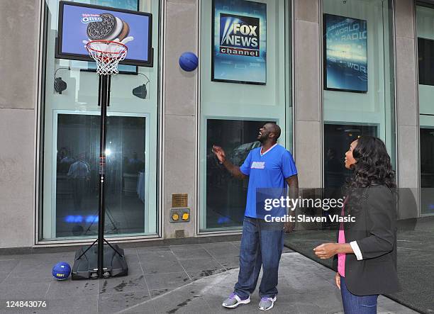 Shaquille O'Neal and Venus Williams visit "FOX & Friends" at FOX Studios on September 13, 2011 in New York City.