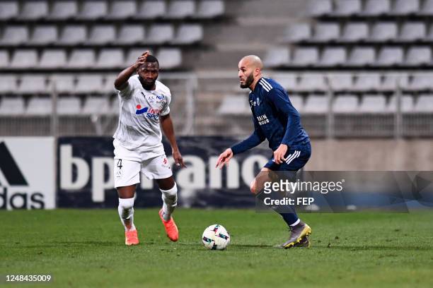 Nicholas OPOKU - 09 Khalid BOUTAIB during the Ligue 2 BKT match Paris FC and Amiens at Stade Charlety on March 14, 2023 in Paris, France.