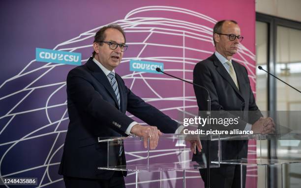 March 2023, Berlin: Alexander Dobrindt , head of the CSU parliamentary group, speaks next to Friedrich Merz, CDU federal chairman and leader of the...