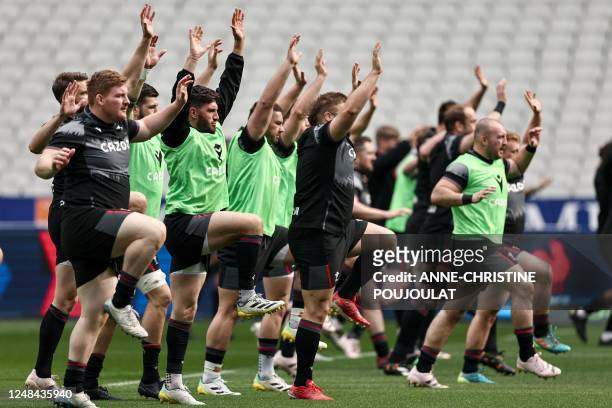 Wales' players attend a Captain's Run at the Stade de France in Saint-Denis, outside Paris, on March 17 on the eve of the Six Nations rugby union...