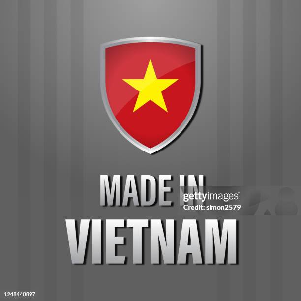 made in vietnam emblem with vietnamese flag - association of southeast asian nations stock illustrations