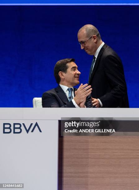 Spain's Banco Bilbao Vizcaya Argentaria Chairman Carlos Torres and Chief Executive Officer Onur Genc attend the bank's general shareholders' meeting...