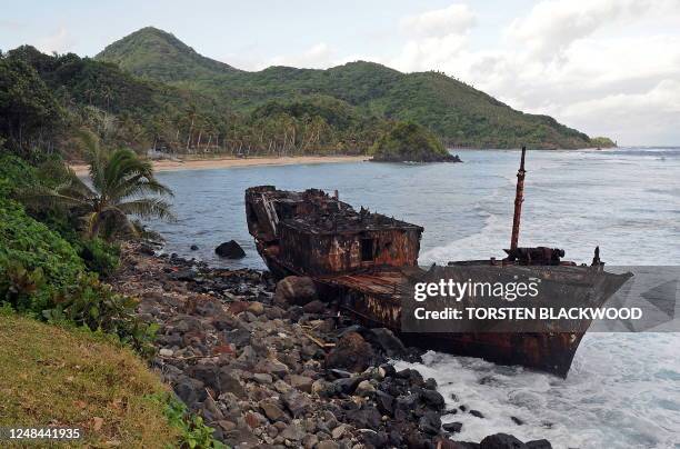 Shipwreck lies at the entrance to Amouli Bay on the east coast of Tutuila in American Samoa on October 2, 2009. The treacherous reefs surrounding the...