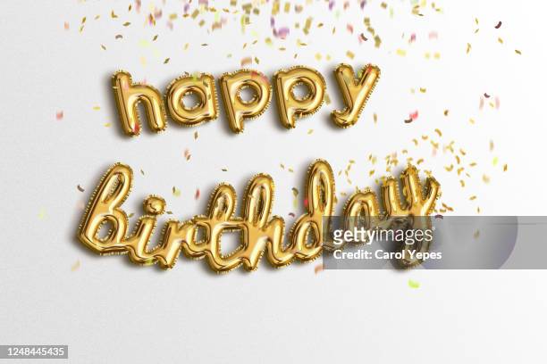 happy birthda ygolden foil balloons - birthday stockfoto's en -beelden