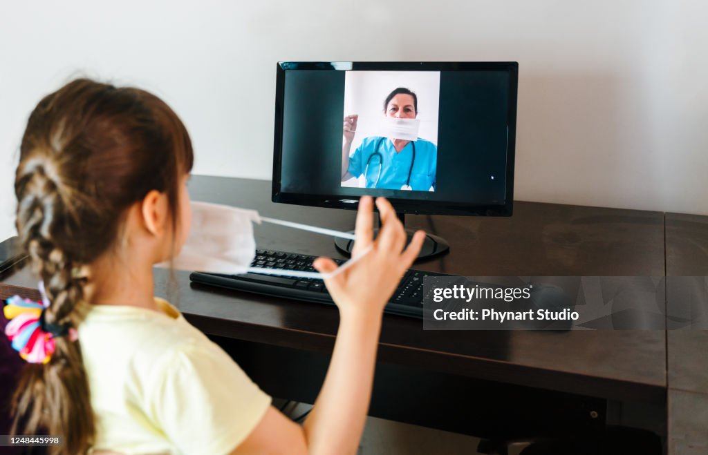 Videoconference Mask Elementary Age Girl Learns To Wear A Mask With Video Conference From ...