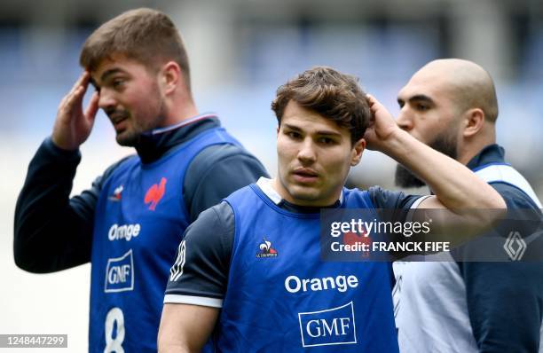 France's number 8 Gregory Alldrittt and France's scrum half Antoine Dupont during a Captain's Run training session at the Stade de France in...