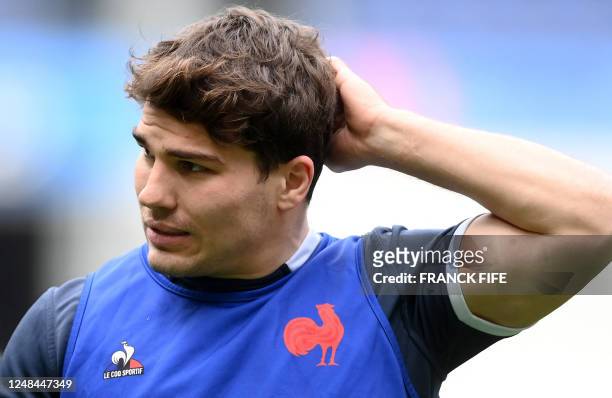 France's scrum half Antoine Dupont during a Captain's Run training session at the Stade de France in Saint-Denis, outside Paris, on March 17 on the...