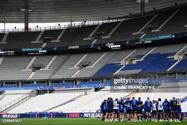 France's players attend a Captain's Run training session at the Stade de France in Saint-Denis, outside Paris, on March 17 on the eve of the Six...