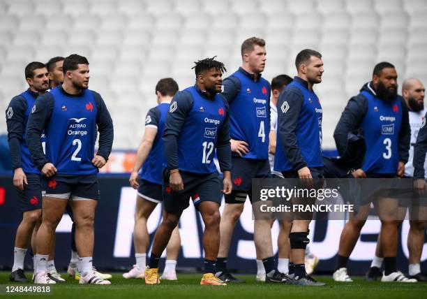 France's players attends a Captain's Run training session at the Stade de France in Saint-Denis, outside Paris, on March 17 on the eve of the Six...