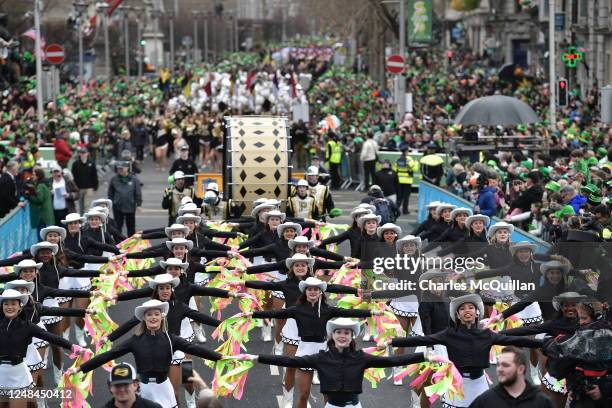 People take part in the St Patrick's Day Parade on March 17, 2023 in Dublin, Ireland. 17th March is the feast day of Saint Patrick commemorating the...