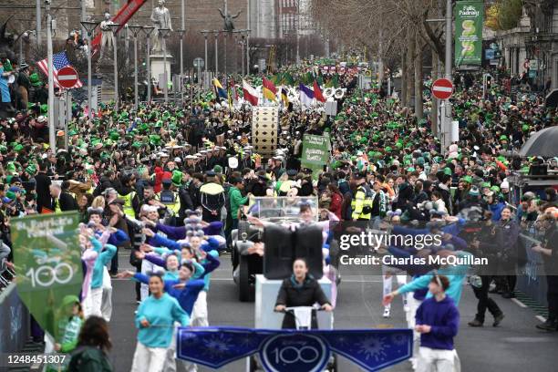 People take part in the St Patrick's Day Parade on March 17, 2023 in Dublin, Ireland. 17th March is the feast day of Saint Patrick commemorating the...