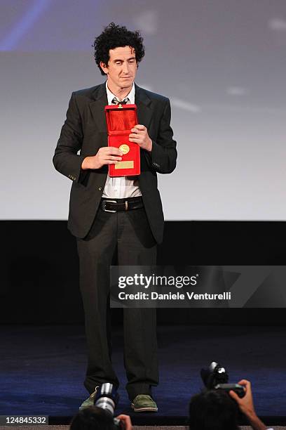 Cinematographer Robbie Ryan of "Wuthering Heights" accepts the Best Cinematography Award during the Closing Ceremony Inside during the 68th Venice...