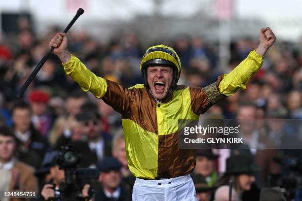 Jockey Paul Townend celebrates as he returns to the winner's enclosure on Galopin Des Champs after victory in the Cheltenham Gold Cup Chase race on...