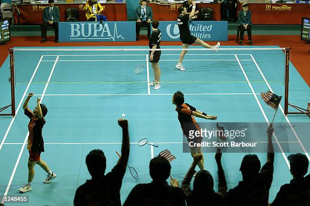 Li Peng Ang and Pek Siah Lim of Malaysia celebrate after defeating Nicole Gordon and Sara Runesten Petersen of New Zealand in the Women's Doubles...
