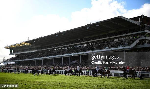 Gloucestershire , United Kingdom - 17 March 2023; A general view of the main stand as the runners and riders parade before the Boodles Cheltenham...