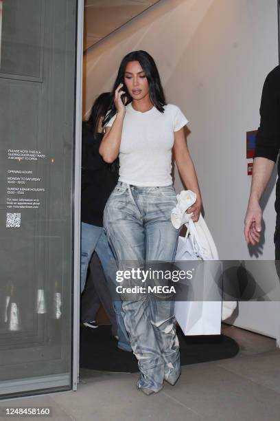 Kim Kardashian is seen shopping at the Victoria Beckham store on March 17, 2023 in London, United Kingdom.