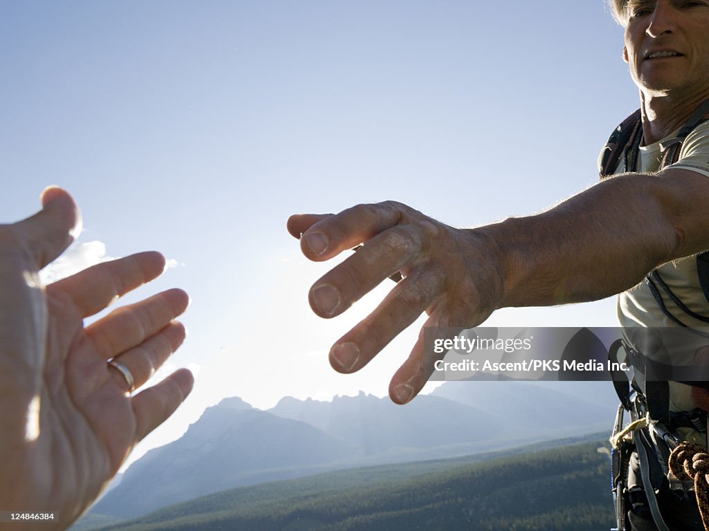 Mountaineer stretches helping hand to teammate