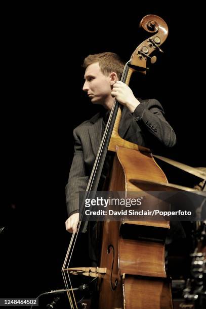 Double bass player Tom Farmer of Empirical performs live on stage at The Barbican in London on 20th November 2008.