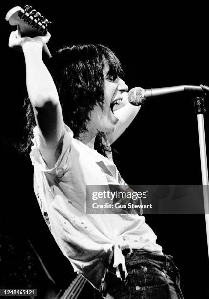 Patti Smith performs for the first time in the UK at the Roundhouse, London, England, on May 16, 1976. Playing guitar feedback which she dedicated to...