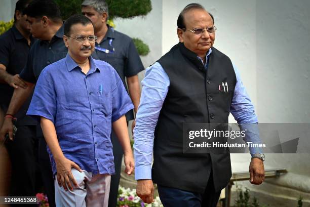 Delhi Lieutenant Governor Vinai Kumar Saxena with Delhi Chief Minister Arvind Kejriwal proceeds for his address on the first day of the Budget...