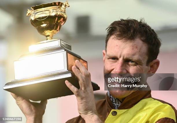 Gloucestershire , United Kingdom - 17 March 2023; Jockey Paul Townend with the Gold Cup after riding Galopin Des Champs to win the Boodles Cheltenham...