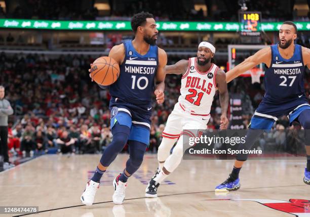 Minnesota Timberwolves guard Mike Conley in action during a NBA game between the Minnesota Timberwolves and the Chicago Bulls on March 17, 2023 at...