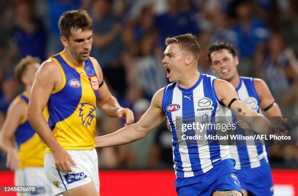 Cameron Zurhaar of the Kangaroos celebrates a goal during the 2023 AFL Round 01 match between the North Melbourne Kangaroos and the West Coast Eagles...