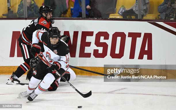 Kenzie Hauswirth of the Ohio State Buckeyes skates the puck out of the corner in the third period during the Division I Womens Ice Hockey Semifinals...