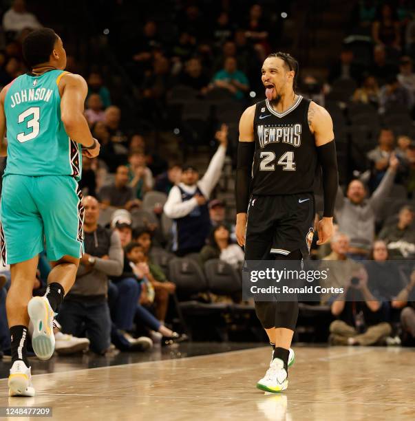 Dillion Brooks of the Memphis Grizzlies teases the fans after a basket against the San Antonio Spurs in overtime at AT&T Center on March 17, 2023 in...