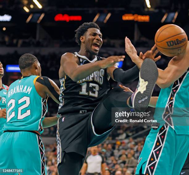 Jaren Jackson of the Memphis Grizzlies reacts after a dunk past San Antonio Spurs Malaki Branham in the second half at AT&T Center on March 17, 2023...
