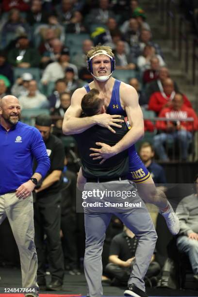 Tanner Sloan of South Dakota State celebrates after his win over Rocky Elam of Missouri during the Division I Mens Wrestling Championship held at the...