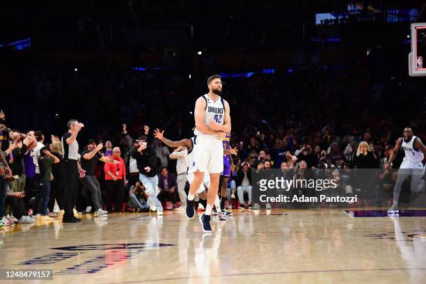 Maxi Kleber of the Dallas Mavericks celebrates after hitting a buzzer beater to win the game against the Los Angeles Lakers on March 17, 2023 at...