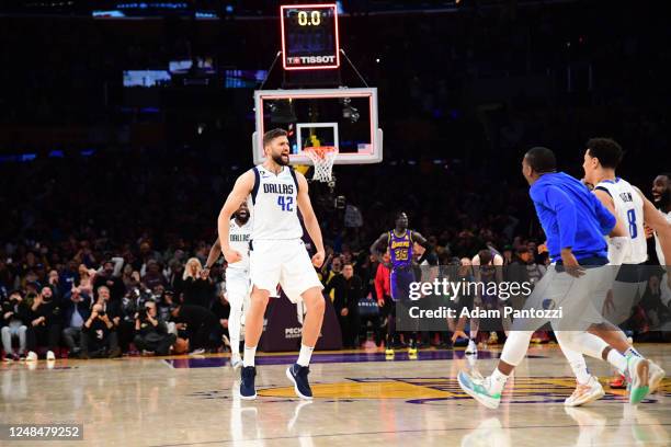 Maxi Kleber of the Dallas Mavericks celebrates after hitting a buzzer beater to win the game against the Los Angeles Lakers on March 17, 2023 at...