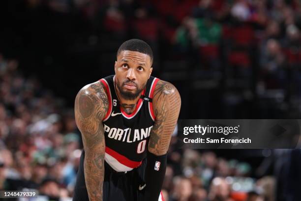 Damian Lillard of the Portland Trail Blazers looks on during the game against the Boston Celtics on March 17, 2023 at the Moda Center Arena in...
