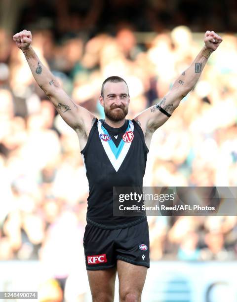 Charlie Dixon of the Power celebrates on the siren during the 2023 AFL Round 01 match between the Port Adelaide Power and the Brisbane Lions at...