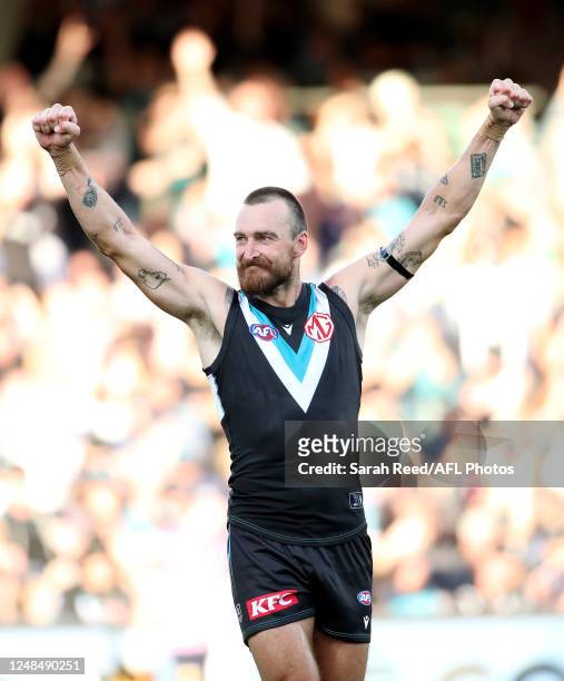 Charlie Dixon of the Power celebrates on the siren during the 2023 AFL Round 01 match between the Port Adelaide Power and the Brisbane Lions at...