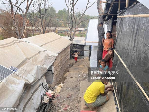 Persecuted Rohingya were rebuilding tents with bamboo and tarpaulin sheets at the refugee camp no. 11 in the southern border district of Coxâs Bazar,...