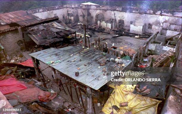 This general view shows 12 August the Santa Barbara jail, 200 Km northwest of the Honduran capital, after it was destroyed by a fire started by the...