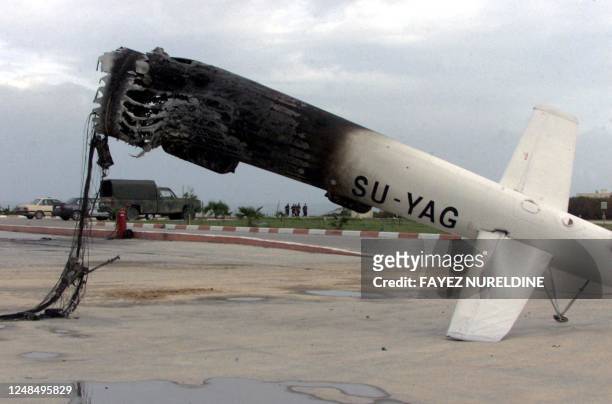 Picture taken 04 December 2001 shows the remains of one of Palestinian Authority President Yasser Arafat's helicopters at Arafat's heliport in Gaza...