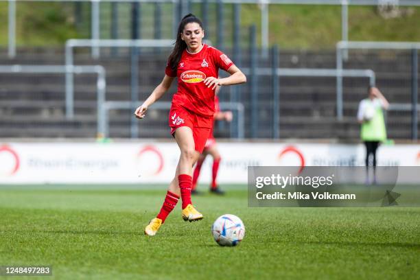 Manjou Wilde of Koeln kicks the ball during the FLYERALARM Frauen-Bundesliga match between 1. FC Koeln and FC Bayern Muenchen at Franz-Kremer-Stadion...