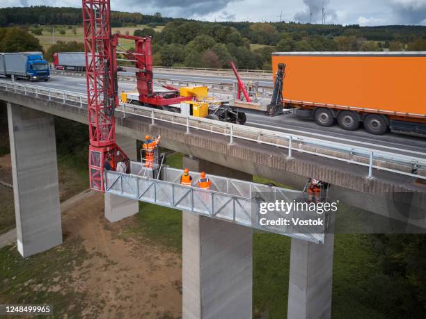 monitoring the operation of the road bridge - bridge built structure fotografías e imágenes de stock