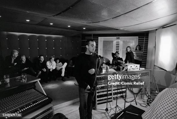 Robbie Williams recording 'Come Fly With Me' for the BBC/Comic relief animated film 'Robbie The Reindeer' in Hooves of Fire at Metropolis Studios in...