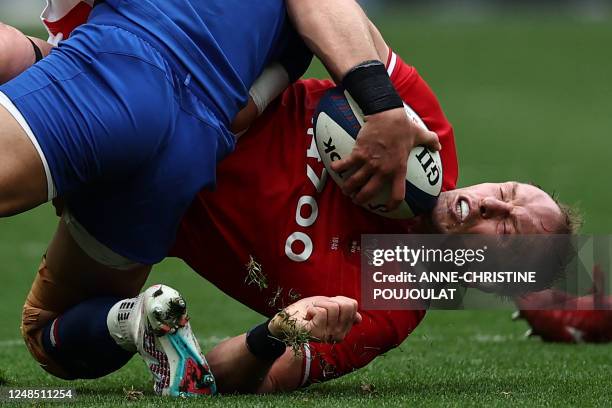 Wales' lock Alun Wyn Jones is tackled by France's centre Gael Fickou during the Six Nations rugby union international match between France and Wales...