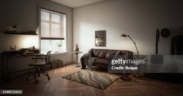 warm and cozy interior - small apartment stock pictures, royalty-free photos & images
