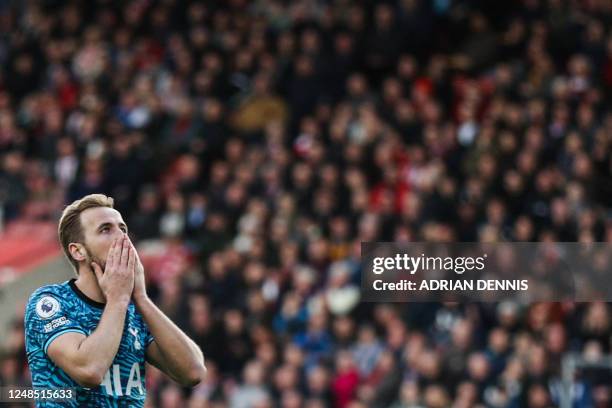 Tottenham Hotspur's English striker Harry Kane reacts after missing to score during the English Premier League football match between Southampton and...