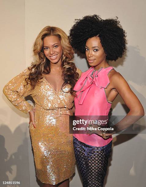 Singers Beyonce Knowles and Solange Knowles attend the J.Crew Spring 2012 fashion show during Mercedes-Benz Fashion Week at The Stage at Lincoln...